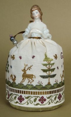 Sampler Doll Pincushion, A